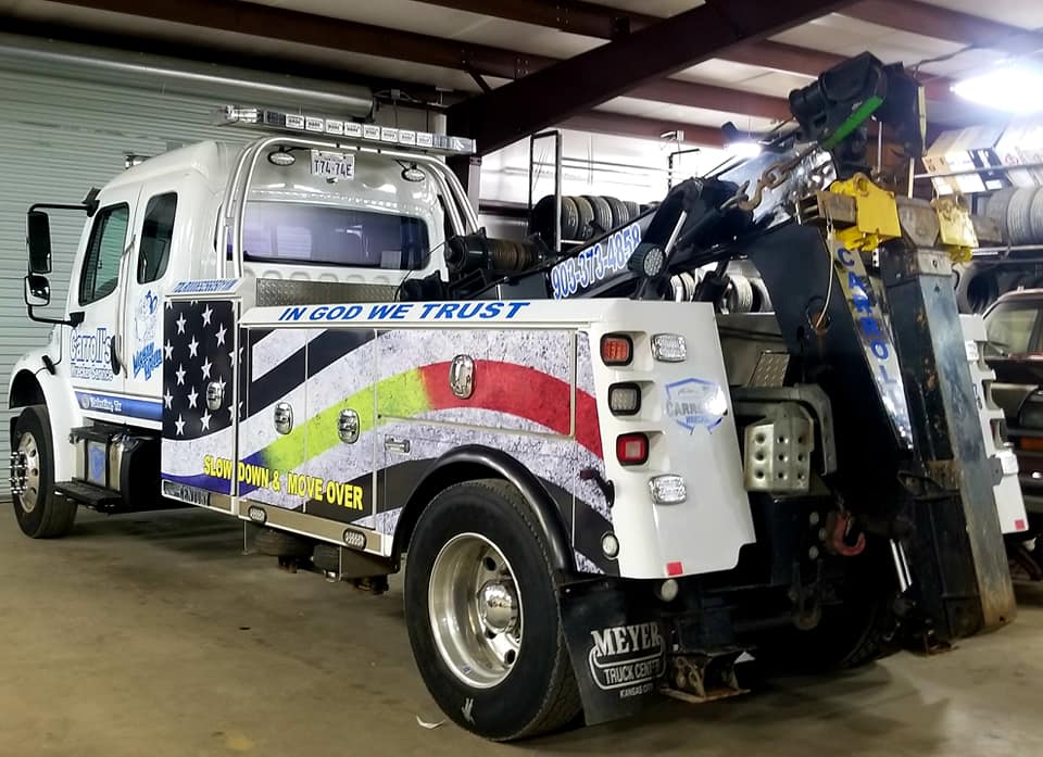tow truck service in Palestine TX inside shop ready for roadside assistance