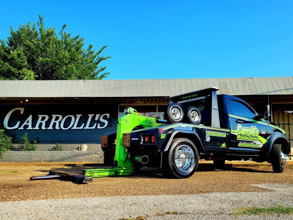 heavy duty towing service in Palestine TX loading vehicle on wrecker